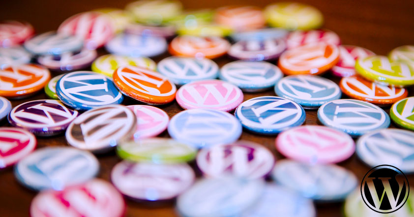 A bunch of multi-colored WordPress logo buttons